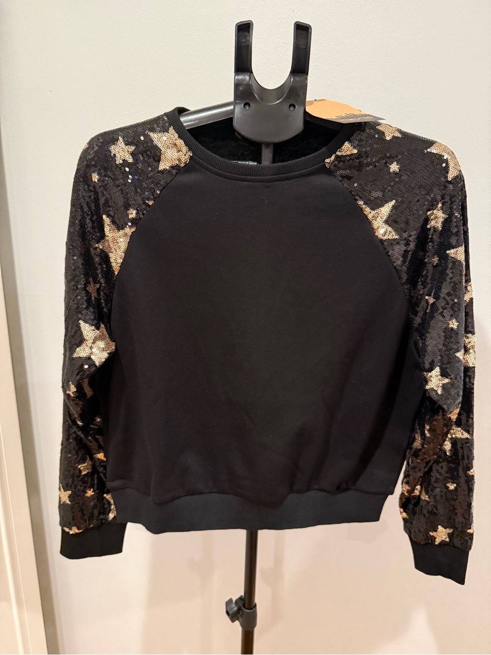 Main Strip Black Sweatshirt with Gold Sequin Star Sleeves